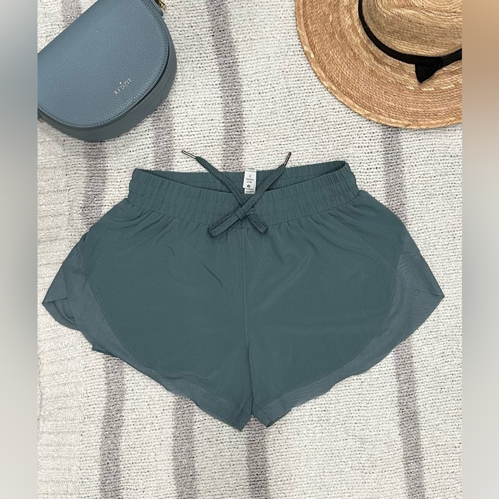 Teal green athletic shorts